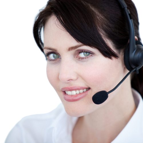 Portrait of sales representative woman with an headset against white background